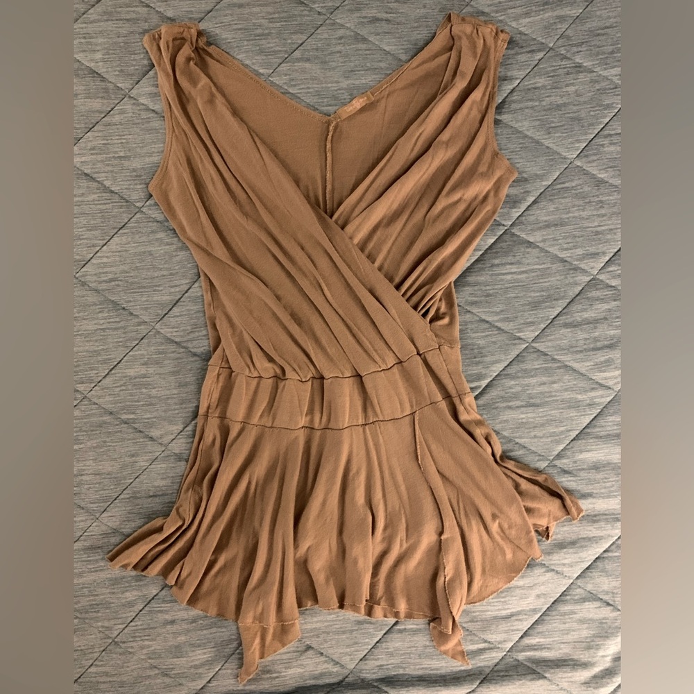 Nude/tan wrap front sleeveless vneck peplum top